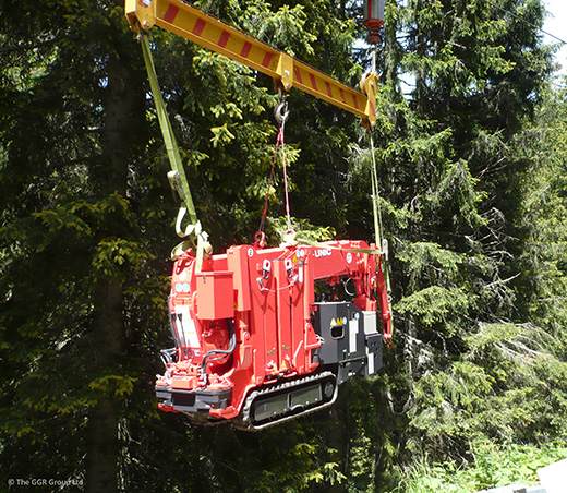 UNIC URW-094 being transported by zip wire