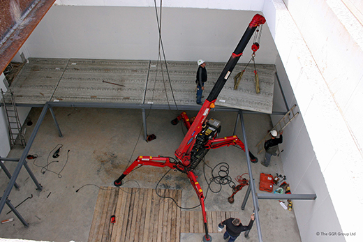 2.9t mini crane lifts concrete panels in underground bunker