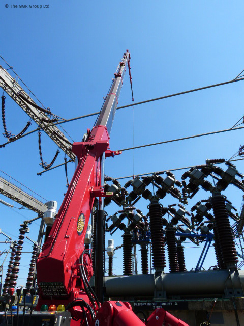 UNIC mini spider crane removing silencers from circuit breakers