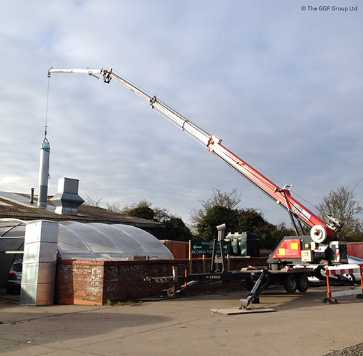 Starworker trailer crane installing chimney