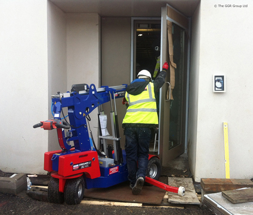 Oscar glazing robot installing blast proof doors