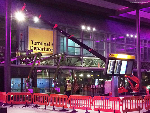 UNIC mini spider crane working inside Heathrow Terminal 3 departures