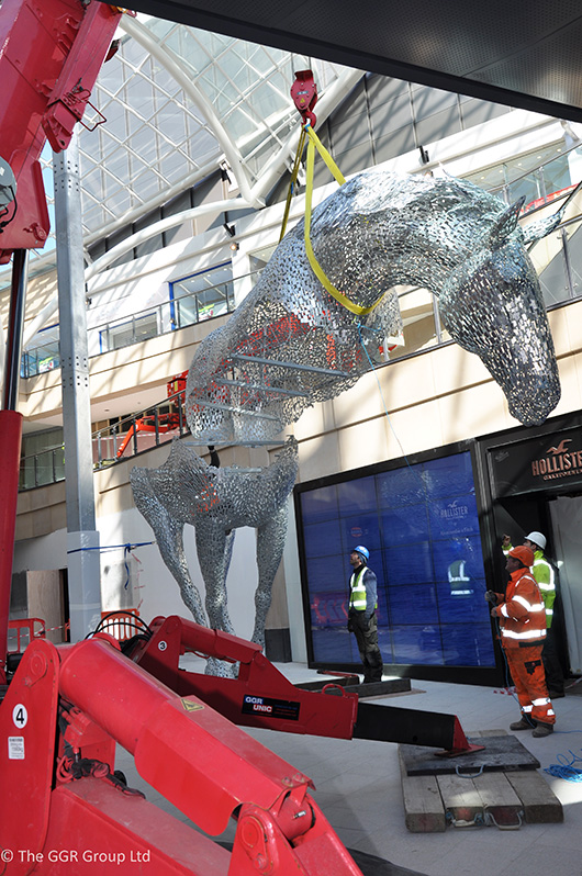 UNIC URW-706 constructing steel horse sculpture