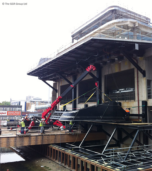 UNIC mini spider crane working at Canary Wharf station
