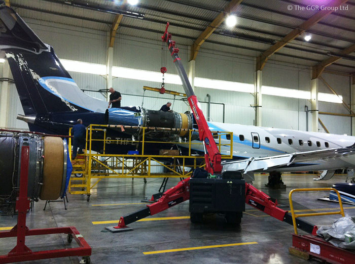 A UNIC URW-376 at Heathrow Airport installing new engines into the Tottenham Hotspur FC private jet.