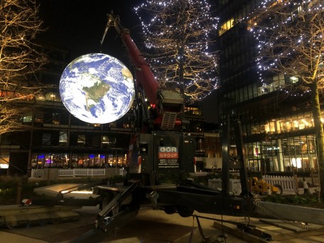 A Starworker 1600 lifting Earth sculpture.