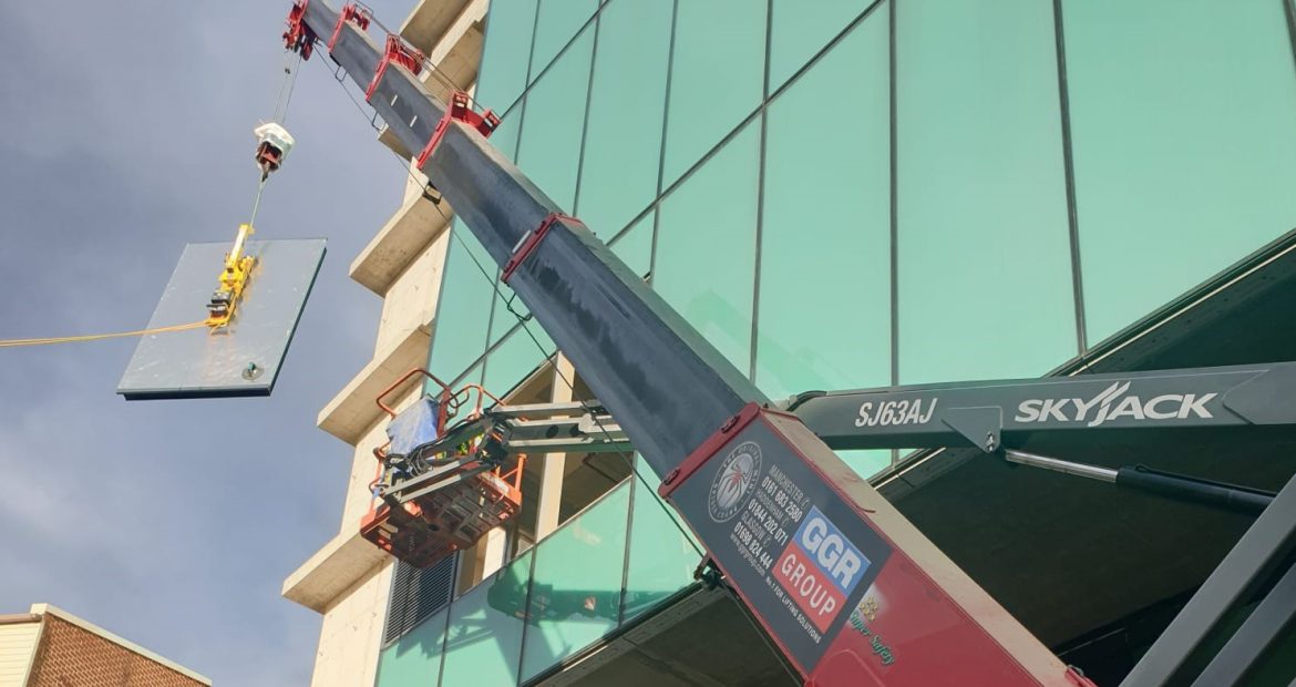 An image of a URW-706 installing a glass panel