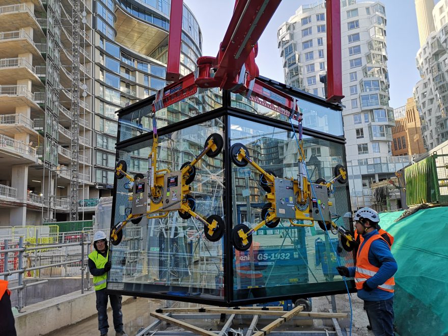 GGR Group's Libro 3000 Overhang Beam with Corner Lifter and 2 DSZ2 Glass Vacuum Lifters lifting a window at art'otel.