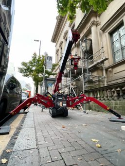 UNIC URW-094 Mini Spider Crane installing a lamp in Manchester City Centre.