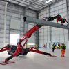 UNIC URW-706 Mini Spider Crane and Multigrab attachment lifting steel beams. One of our multifunctional attachments made for versatility.