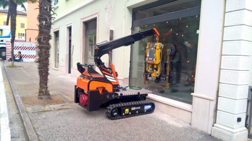 TMC 060 Tracked Pick and Carry Crane installing glazing.