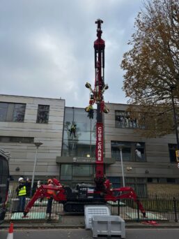 The UNIC Cube Crane installing glazing for the City of London Academy.