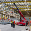 A GF250 Pick & Carry Crane lifting machinery in a UK drinks manufacturing facility.
